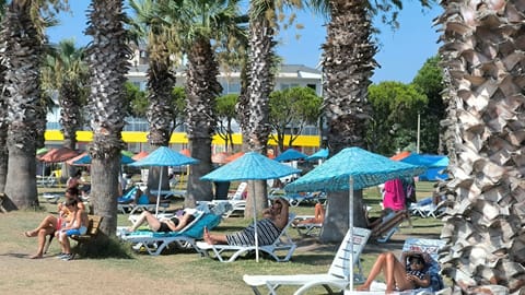 On the beach, sun loungers, beach umbrellas, 3 beach bars