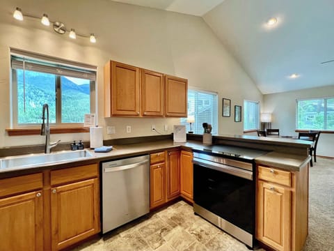 Fully equipped kitchen with new dishwasher and stove and essentials