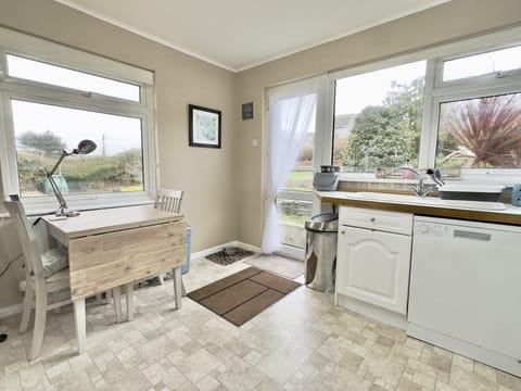 Table in the kitchen of Curlews, 36 Egerton Road Holiday Cottage, Padstow, North Cornwall