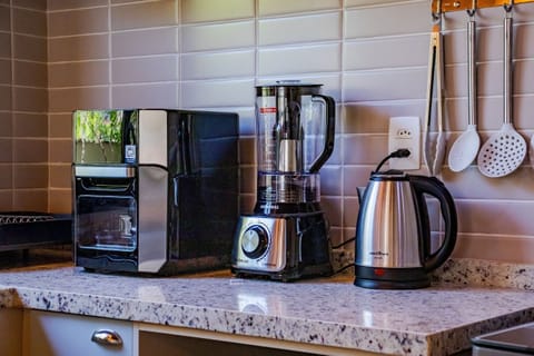 Villa | Private kitchen | Fridge, microwave, oven, stovetop