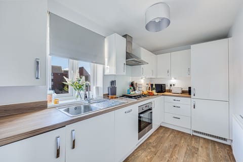 A fully equipped kitchen with everything you need to prepare a home cooked meal