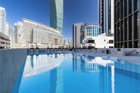 Outdoor pool, pool umbrellas, sun loungers