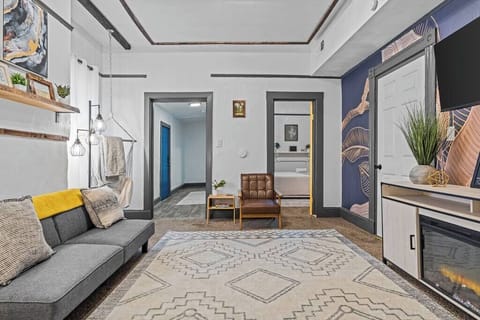 Cozy seating area with modern accents and plenty of natural light. A perfect spot to unwind.