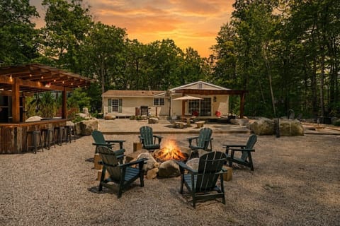 Spacious outdoor patio with a cozy firepit — ideal for s’mores, stories, and stargazing