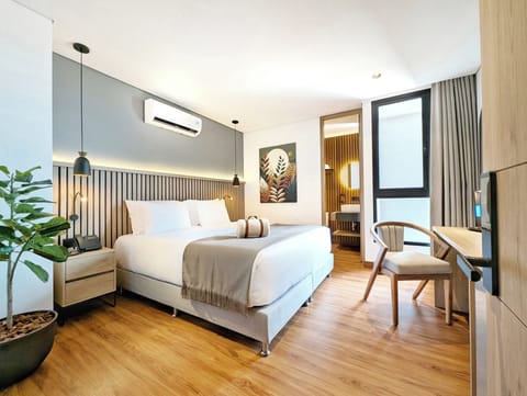 Standard Double Room, City View | Minibar, in-room safe, individually decorated, individually furnished