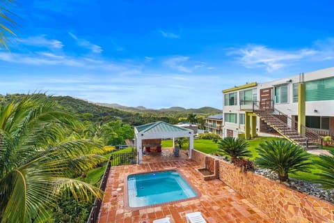 Tropical retreat with pool and stunning views.