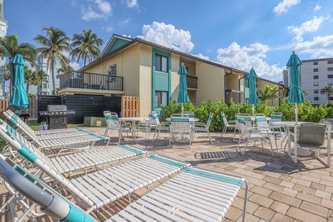 Bac Bay Sundeck and BBQ area welcomes guests to relax and take in the sunshine and the Gulf breezes.