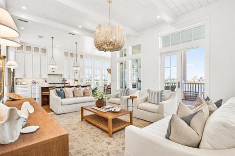 Primary Living Area, 2nd Floor - Featuring panoramic lake views and balcony access.