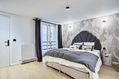 Grand studio avec lit queen size 