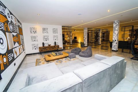 Economy Apartment, Balcony, City View | Living area | Flat-screen TV
