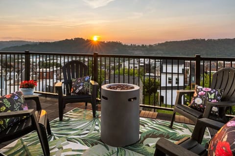 Elevated serenity with unbeatable location—watch sunsets from the third-floor deck, gather around the fire pit, and soak in views that remind you why you came