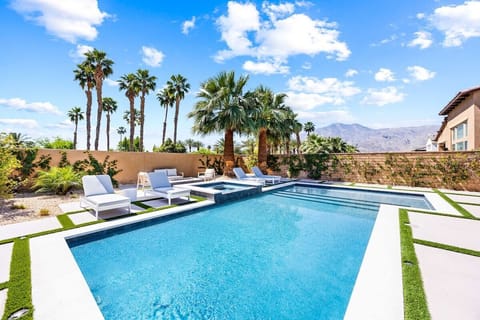 Dive into your private pool surrounded by towering palms and Santa Rosa Mountain views.