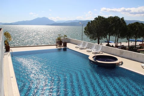 Outdoor pool, pool umbrellas, sun loungers