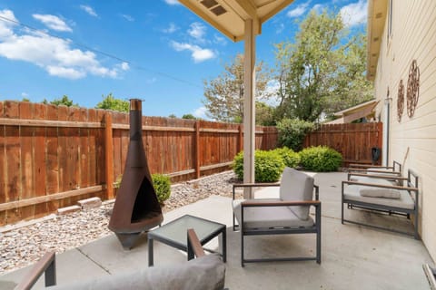 Wander outside and you'll find the covered patio with cozy seating and a wood-burning chiminea
