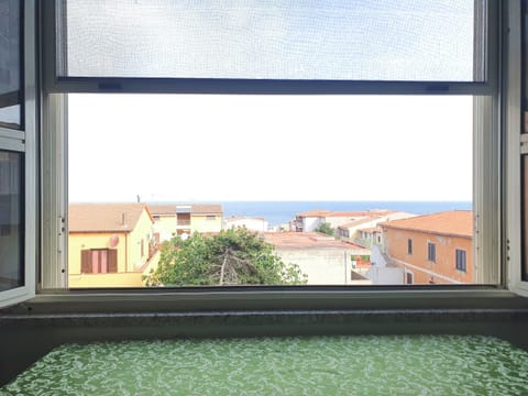 Standard Studio, Patio, Partial Sea View | Living area | Flat-screen TV