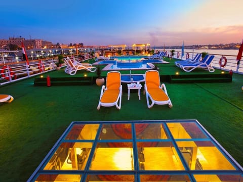 Indoor pool, outdoor pool, open 6:00 AM to 7:00 PM, pool umbrellas