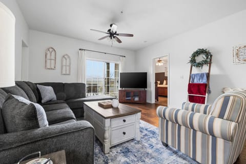 Unwind in a cozy, sunlit living space- perfect for relaxing after a day out.