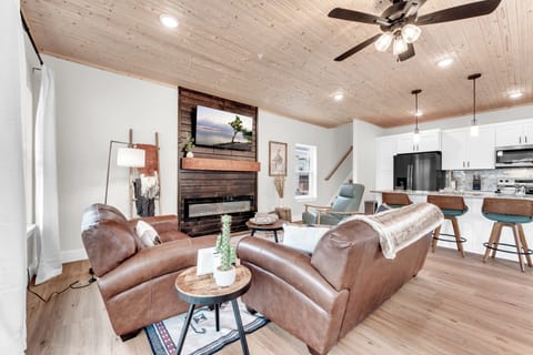 With a comfy couch, loveseat, and a recliner.