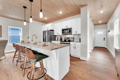 This modern kitchen island offers plenty of space for casual dining.