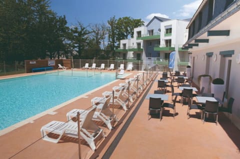 Lounge by the pool in the sunshine and take a dip in the outdoor pool.