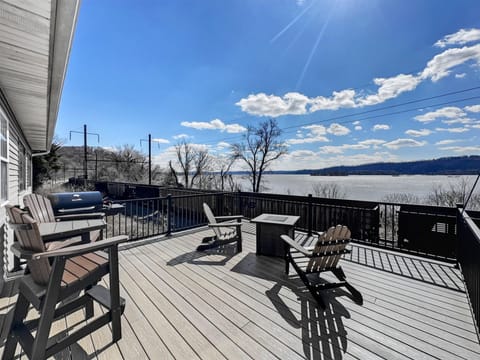 Expansive views of the Susquehanna and passing trains from the private deck seating area.