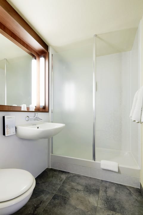 Standard Room, Multiple Beds | Bathroom | Eco-friendly toiletries, hair dryer, towels