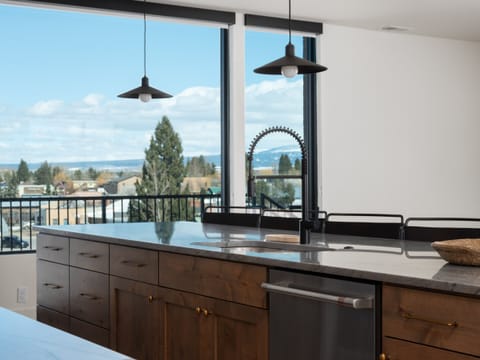 Breathtaking kitchen views of the mountains and skyline