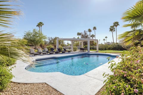 Sparkling pool surrounded by mini golf course