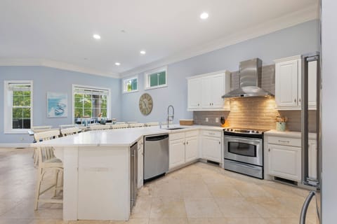Fully stocked kitchen with stainless steel appliances