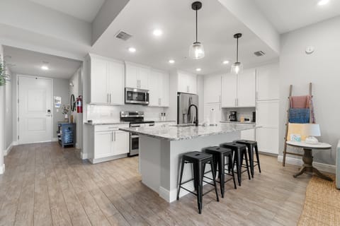 Step into comfort, where our fully stocked kitchen is the first to make you feel at home.