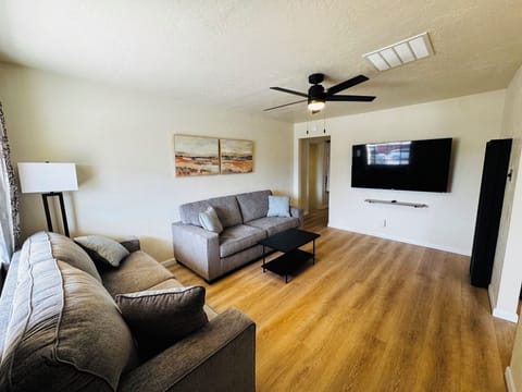 Living room with 65inch Smart TV!