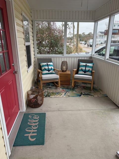 Lanai on front of home. Perfect watching beach volleyball across the street.