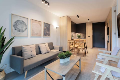 Experience cozy living in this stylish studio with a modern kitchen and inviting decor, perfect for a relaxing stay.