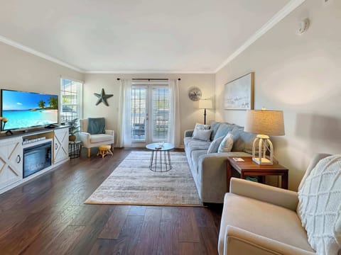 Curl up in the coastal living room & stream your favorites on the smart TV