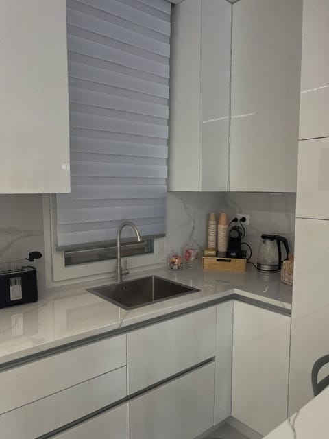 Fridge, microwave, espresso maker, coffee/tea maker