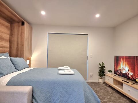 Queen bed and smart TV