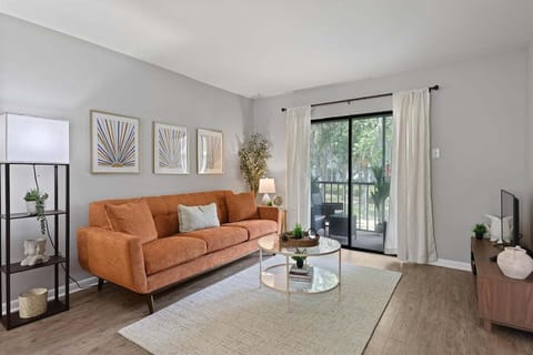 Unwind in this inviting living room, where soft seating meets a smart TV—perfect for movie nights or catching up on your favorite shows.