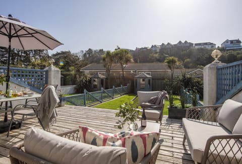 Bluebirds, Polzeath: Sunny garden with lovely raised decking