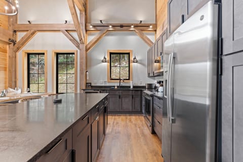 Large granite island with a modern kitchen.