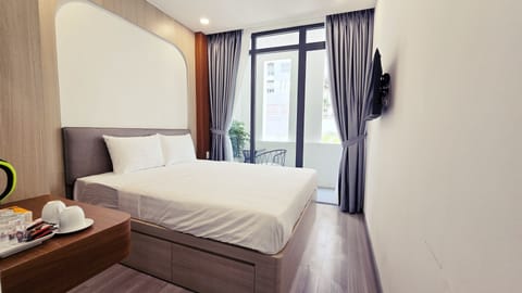 Deluxe Double Room, Balcony, City View | Desk, laptop workspace, free WiFi