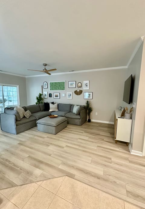 Large main living/dining/kitchen area with new appliances and all new furniture