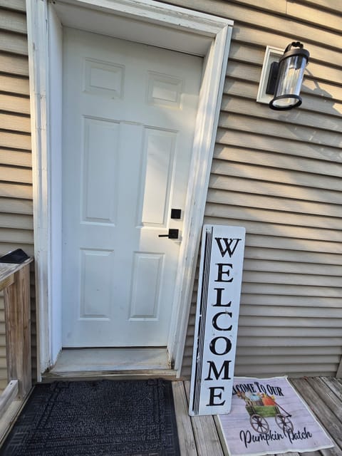 You enter through the side door into the laundry room.