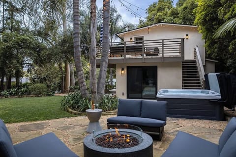 Zen-like sitting area amongst the trees with firepit and jacuzzi!