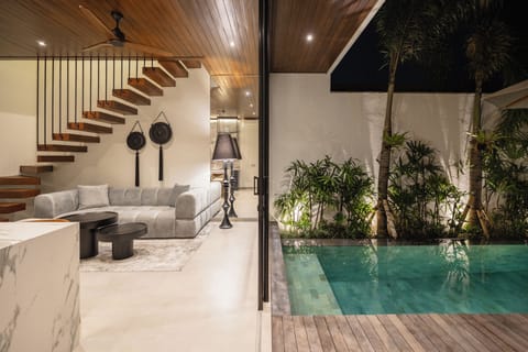 Deluxe Villa, 2 Bedrooms, Balcony, Pool View | Living area | 40-inch Smart TV with digital channels