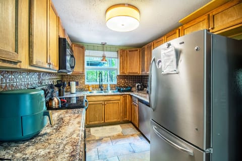 Full kitchen includes stove top, oven, microwave, dishwasher, refrigerator, and more!