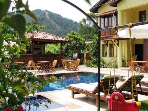 Seasonal outdoor pool, pool umbrellas, sun loungers