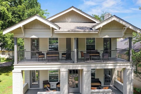 The full exterior showcases the distinctive architecture and welcoming entrances of Units 2 & 4, inviting guests into a world of comfort and elegance.