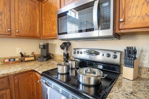 Fully equipped kitchen with all essentials, ready for cooking delicious meals during your stay.