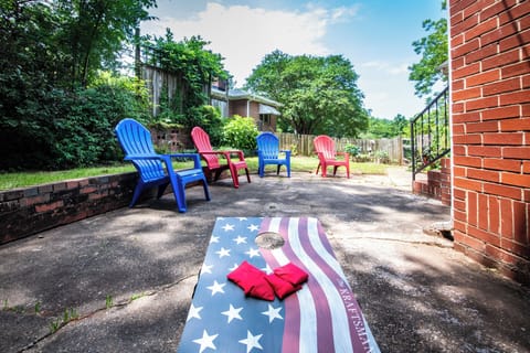 In the backyard you will find plenty of seating, amble room for out door activities, and even a gas grill.