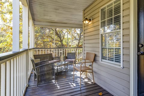 Balcony: Relax on the private balcony with cozy seating and stunning views of the surrounding greenery.